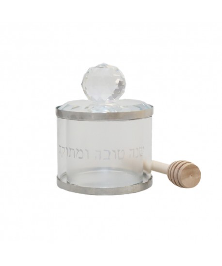 Honey jar with wooden spoon