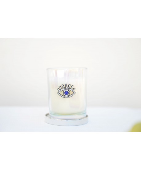 Bougie argent œil parfum patchouli