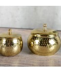 Small round gold candle