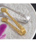 Golden sugar tongs