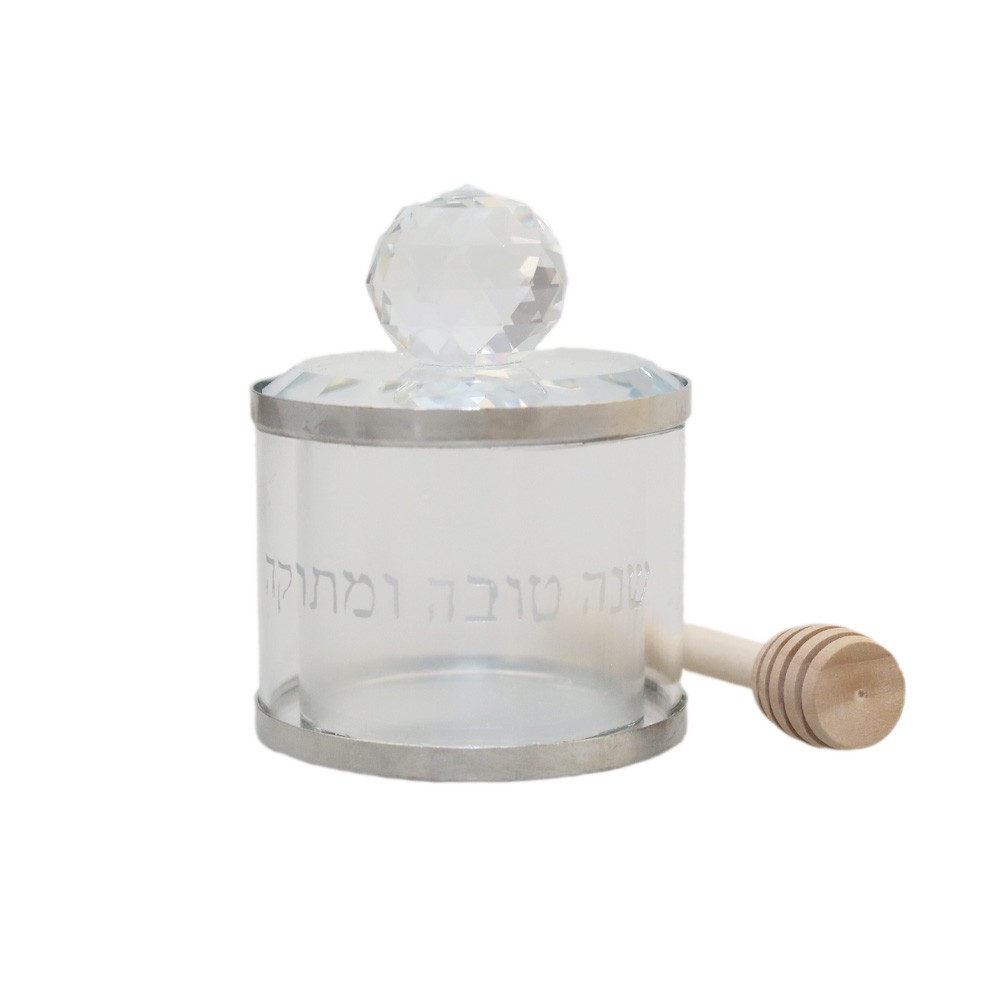 Honey jar with wooden spoon