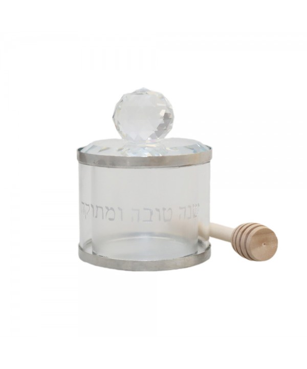 Honey jar with wooden spoon